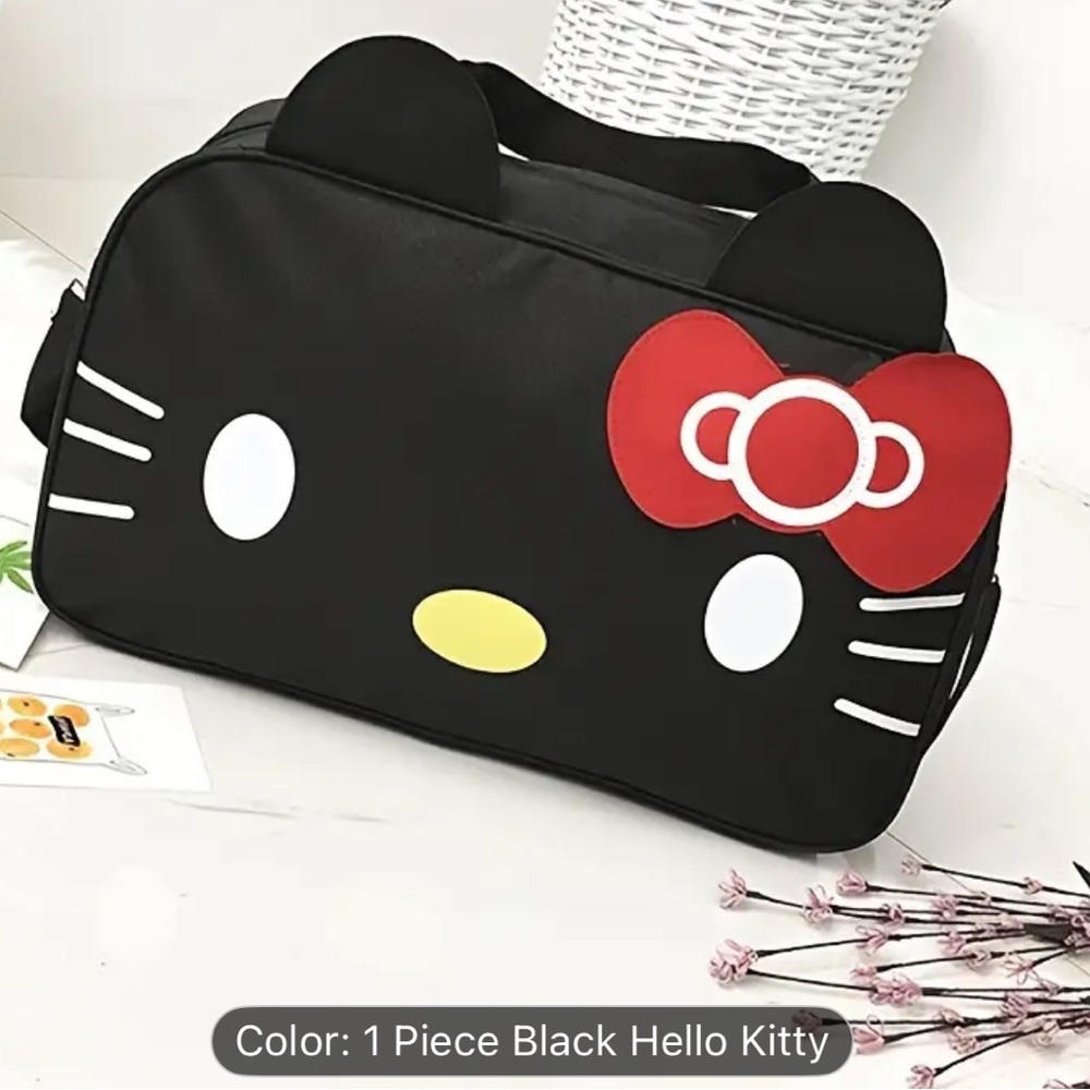 Hello Kitty Black Bag with Red Bow. NWT stocking stuffer